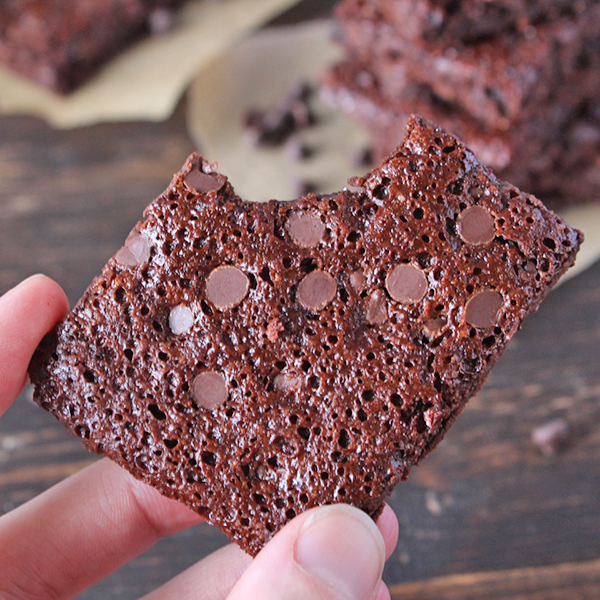 Paleo Brownie Brittle Bark with a bite out of it