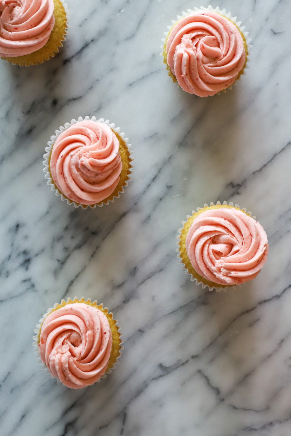 Vanilla Strawberry-Filled Cupcakes with Strawberry Buttercream Icing